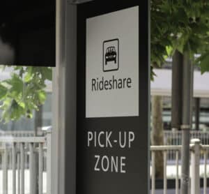 Rideshare pick-up zone sign.