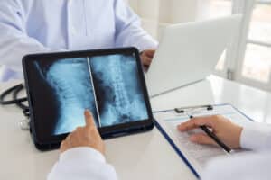 lumbar vertebrae x-ray image by mri on digital tablet