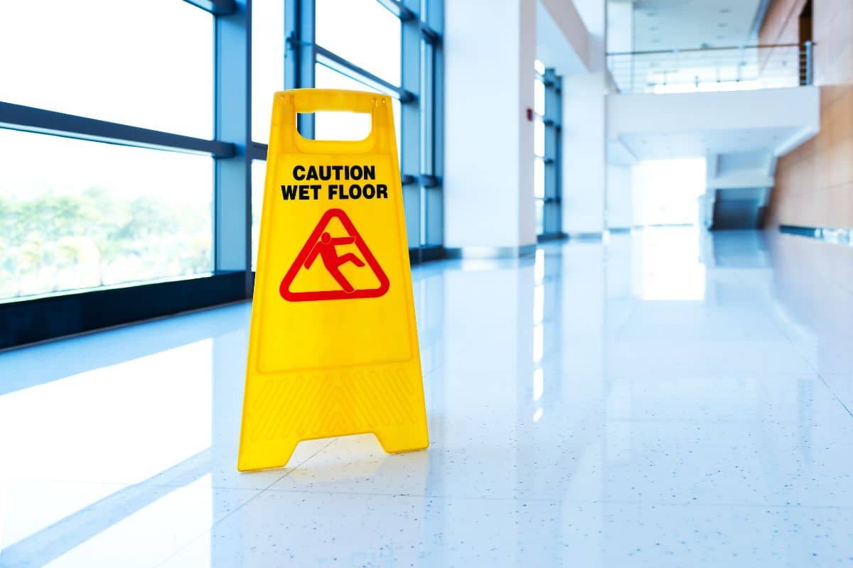 caution sign wet floor premises liability