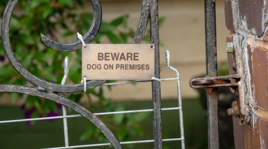 beware of dog sign on property
