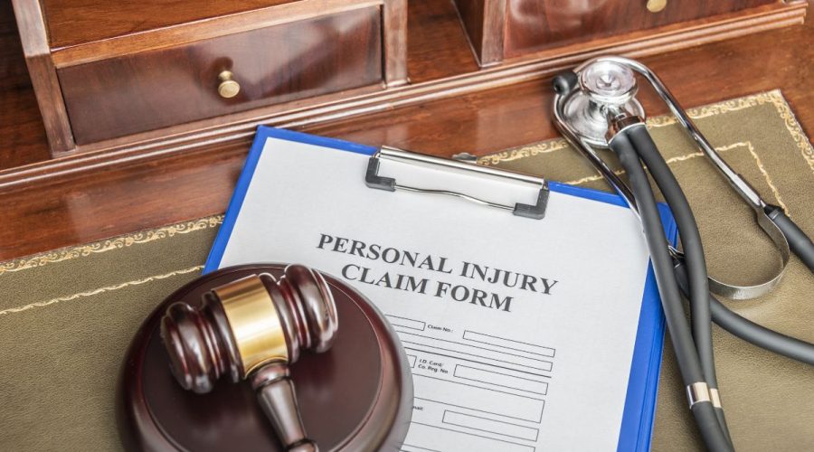 personal injury claim form with gavel
